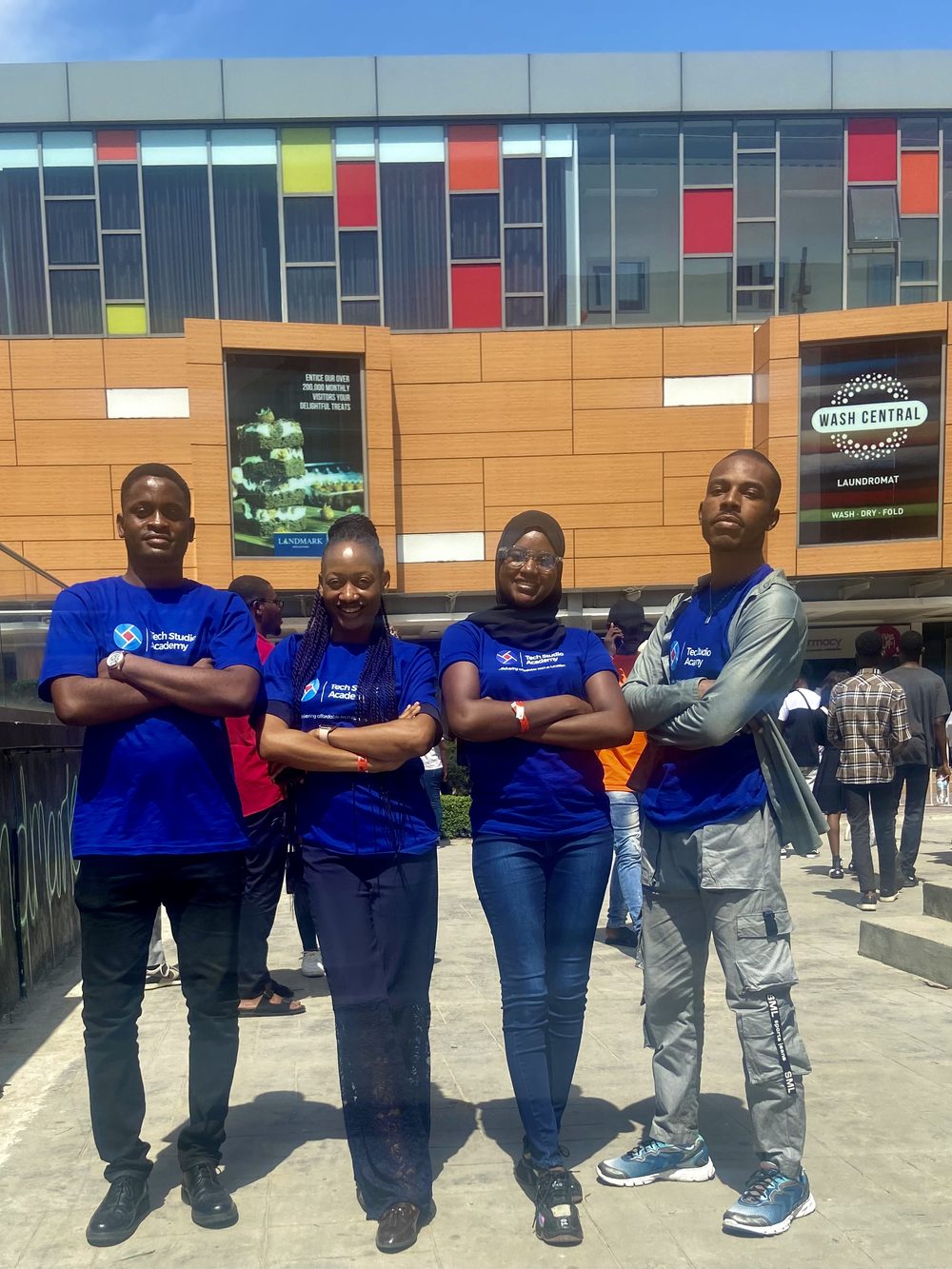 TSA students with academy banner